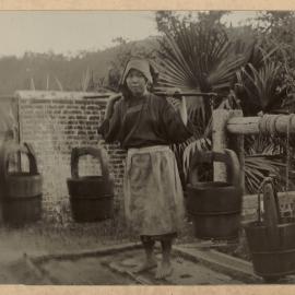 A Hakka Girl Carrying Water.