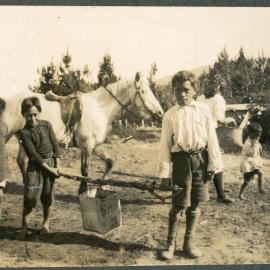 Mission House Boy's Carrying Water