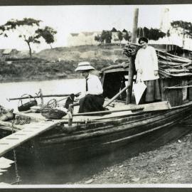 "Nankin," Unidentified women on a houseboat in Nankin