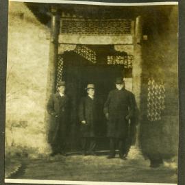 Reverend Professor W. Hewitson at the Pekin Legation with two unidentified men