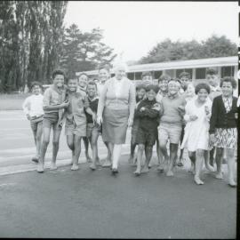Miss J. M. Milroy and School Children