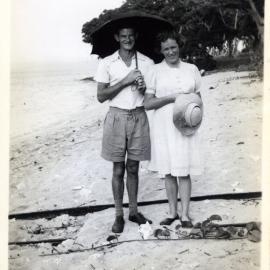 Rev. and Mrs. Horwell on beach at Nguna