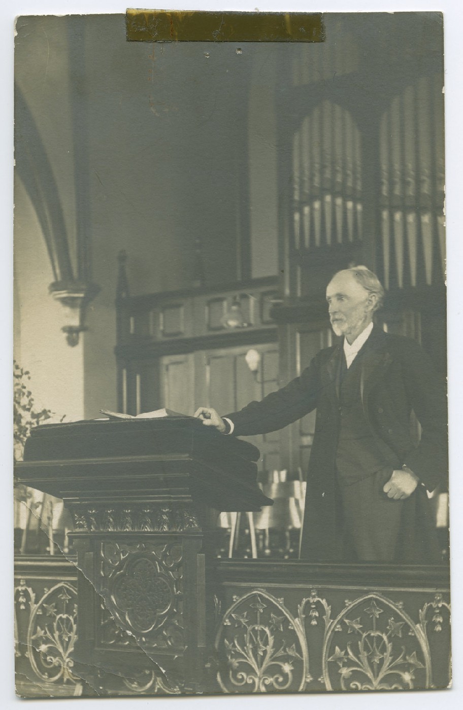 Rev. Rutherford Waddell, seen standing at the pulpit in St. Andrew's Presbyterian Church, Dunedin, on his 38th anniversary at St. Andrew's, April 1917.
P-A62.1-1