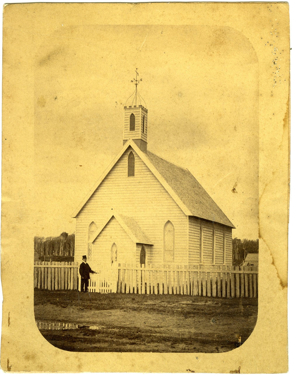 Rev James Duncan standing at the picket gate of the small wooden church at Foxton.
P-A69.8-18Rev James Duncan standing at the picket gate of the small wooden church at Foxton.
P-A69.8-18